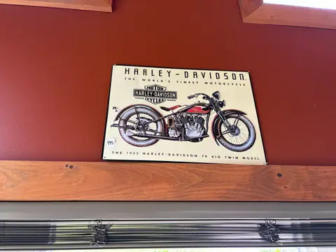 145: Motorcycle Sign - online auction on EastBid