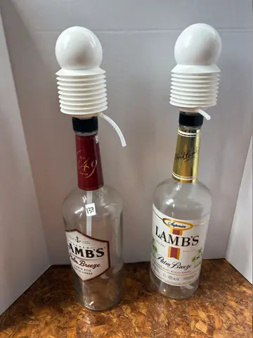 137: Decorative Pouring Bottles - online auction on EastBid