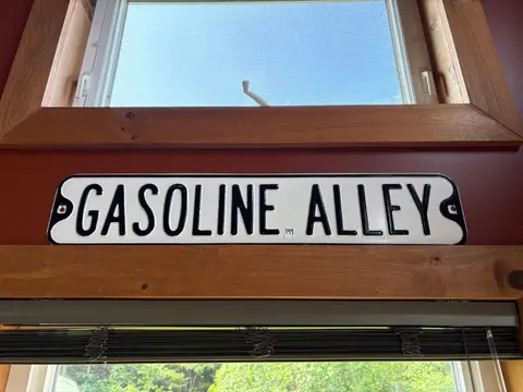 144: Gasoline Alley Sign - online auction on EastBid