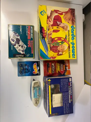 65: Vintage Toy Cars - Porsche 917K RC, Sears Jeep RC, Darda Set - online auction on EastBid