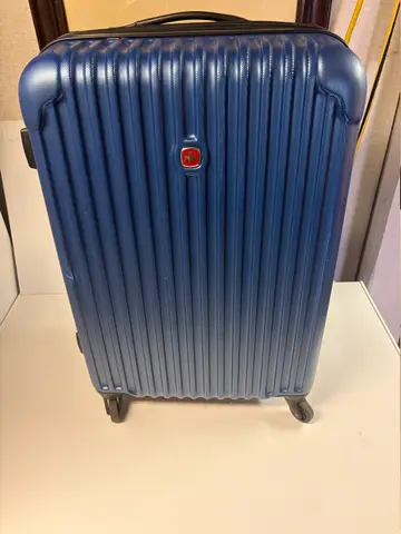 71: SwissGear Blue suitcase is 11 x 16 x 25 inches tall - thumbnail 1