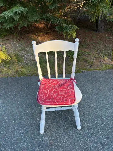 28: White Spindle-Back Wooden Chair with Red Seat Cushion - thumbnail 1