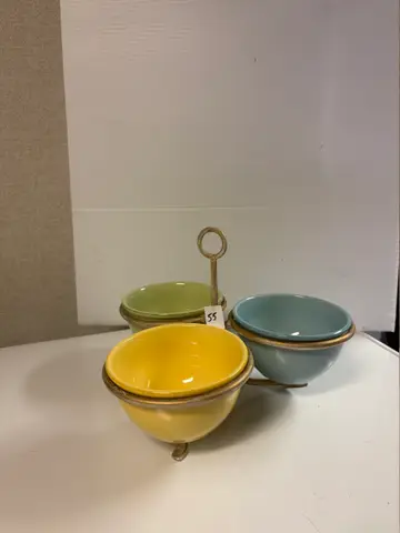 55: Set of 3 Ceramic Bowls in Gold-Tone Metal Caddy - online auction on EastBid